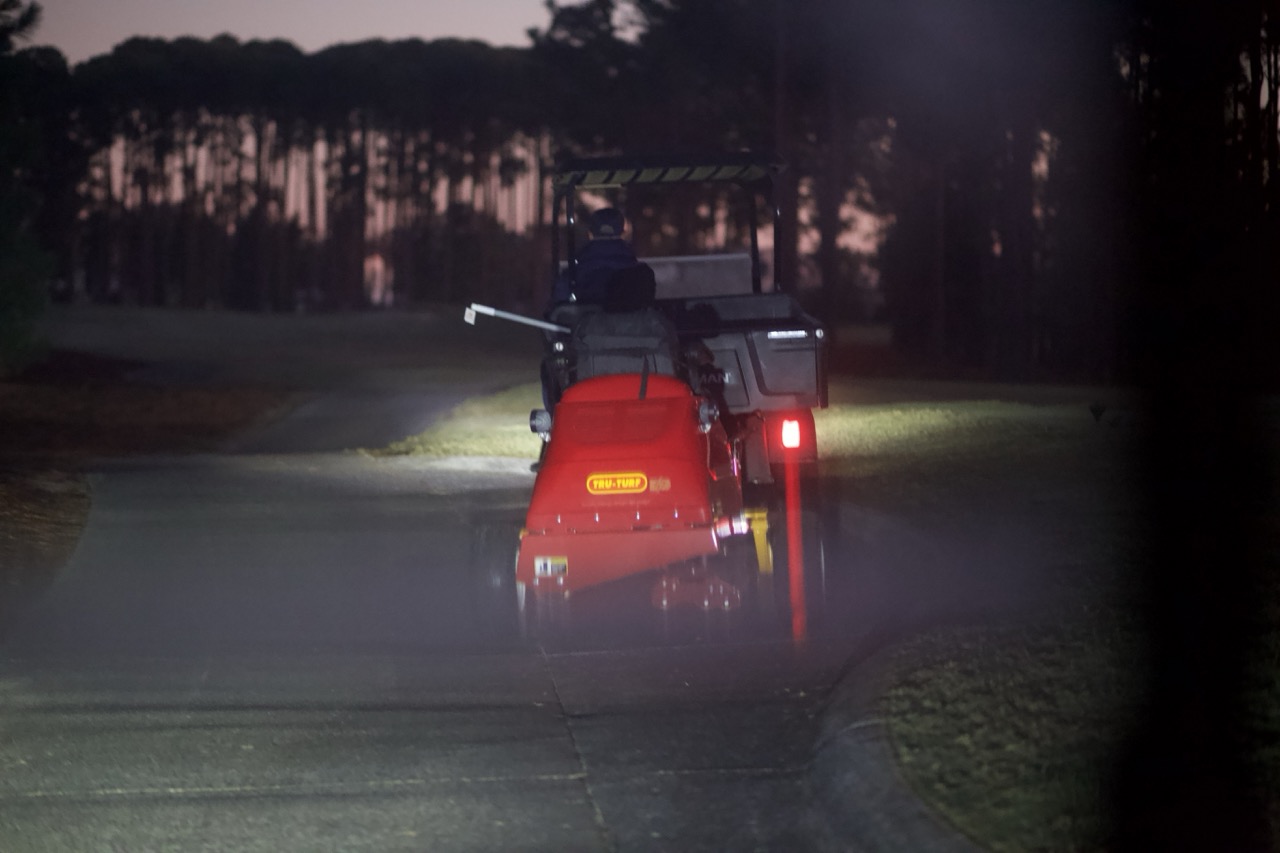 Tru-Turf electric roller being used early morning for golf course maintenance